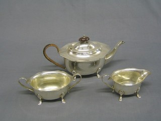 A Georgian style silver plated 3 piece tea service comprising teapot, cream jug, twin handled sugar bowl