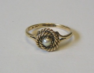 A lady's 9ct gold dress ring set a demi-pearl