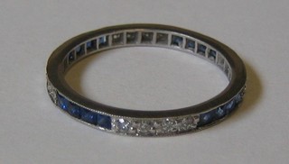 A lady's 18ct white gold eternity ring set sapphires and diamonds