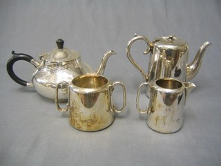A silver plated 3 piece hotelware tea service with  teapot, cream jug and twin handled sugar bowl and a silver plated teapot