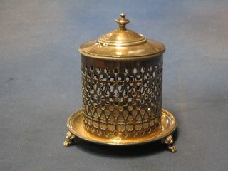 A pierced circular silver plated preserve jar holder and cover (no liner) raised on hoof feet 6"