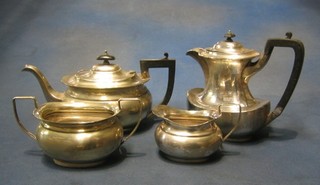 A silver plated Georgian style 3 piece tea service with teapot, twin handled sugar bowl and cream jug and a similar hotwater jug
