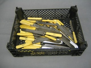 A collection of ivory handled cutlery