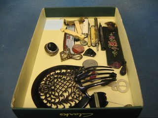 A jet horseshoe shaped brooch, a "Tigers eye" brooch, 2 folding pocket knives, hair slides, various curios etc