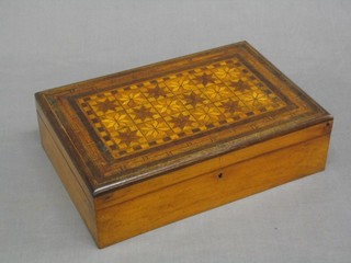 A 19th Century parquetry trinket box with hinged lid and fitted interior 14"