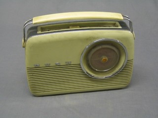 A 1960's Bush type TR82C radio in a green plastic case