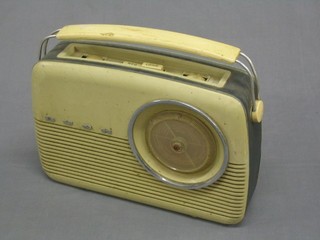 A Bush TR82C radio contained in a green plastic case