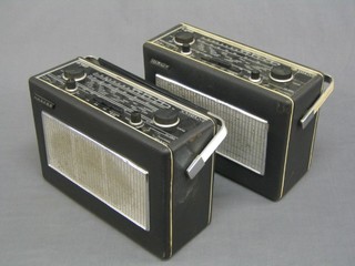 2 Hacker Sovereign 2 radios contained in black fibre cases