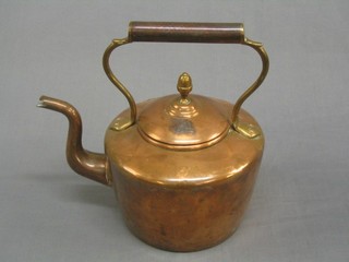 A 19th Century copper kettle with acorn finial