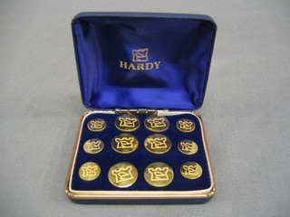 A set of 12 Hardy gilt metal blazer buttons, boxed