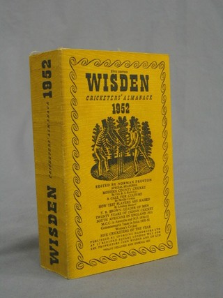 A 1952 edition of Wisden (paper covers)