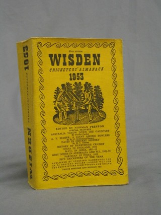 A 1953 edition of Wisden (paper covers)
