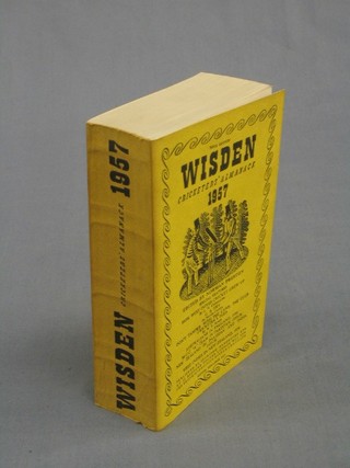 A 1957 edition of Wisden (paper covers)