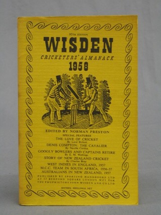 A 1958 edition of Wisden (paper covers)