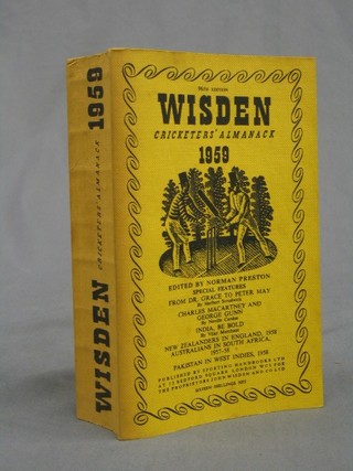 A 1959 edition of Wisden (paper covers)
