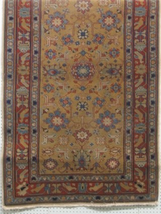 A Caucasian rug with brown ground and geometric design within multi row borders 60" x 36"