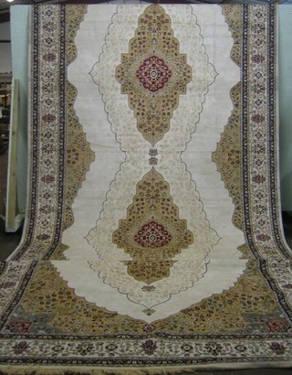 A white ground machine made Persian style  rug 272" x 98"