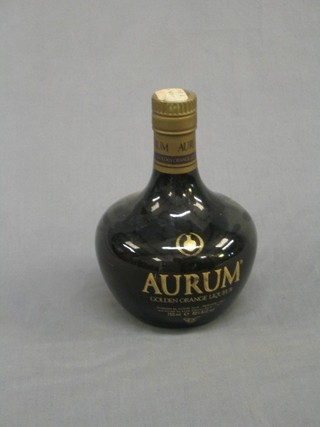 A bottle of Aur Rum Golden Orange liqueur