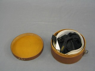 A 1930's circular collar box with collection of various collars, together with a 1930's collar shirt, boxed, as new