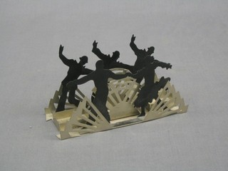 An Art Deco chromium plated table top cigarette/match holder decorated dancing figures 6 1/2"