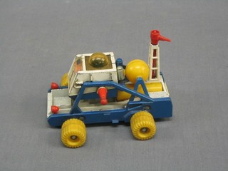 A Corgi James Bond 007 Diamonds Are For Ever moon buggy (played with condition)