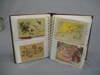 An album containing various greetings cards etc