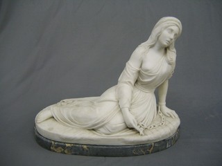 A handsome 19th Century carved marble figure of a kneeling female prisoner with manacles and cross (arm of cross chipped and several chain links chipped) 24" raised on an oval base