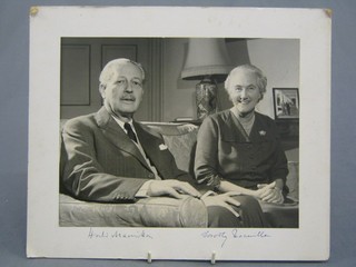 A black and white photograph of Sir Harold and Lady McMillan signed in the margin Harold McMillan and Dorothy 8" x 9 1/2"