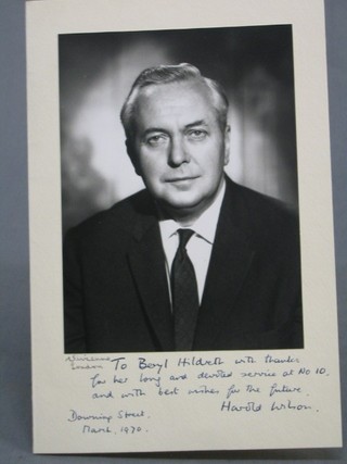 A black and white photograph of Harold Wilson with inscription to bottom To Beryl Hildreth with thanks for your long and devoted service at Number 10 and with best for the future, Harold Wilson, Downing Street 17th March 1970, together with a letter about Chequers, a guide to Downing Street and a Downing Street envelope
