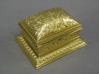 An impressive 19th Century embossed brass jewellery box with hinged lid 11"