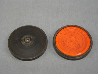 A 19th Century sealing wax seal of a knight contained in a turned case 3"