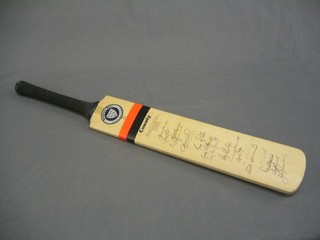 A Newbery cricket bat signed by the 1985 Australian touring cricket team and the Sussex cricket team