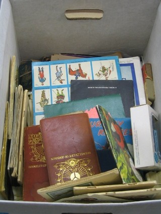 A collection of ephemera, cigarette cards, tea cards etc