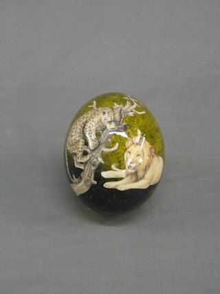 A 20th Century painted ostrich egg decorated game animals 6"