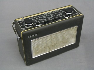 A Hacker Sovereign II portable radio in a black fibre case