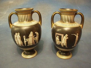 A handsome pair of Victorian Prattware Grecian style black glazed twin handled  vases, the bases marked F & R Pratt Frinton Manufacturers to Prince Albert 10"
