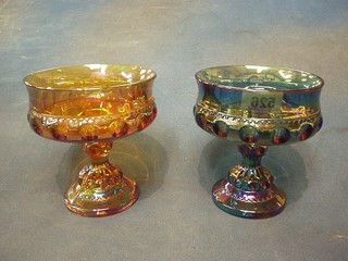 A blue Carnival glass pedestal bowl 5" and an amber coloured ditto