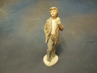 A Nao figure of a standing boy with bag 10"