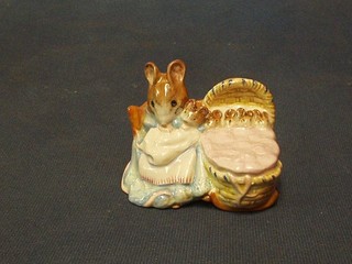 A Beswick Beatrix Potter figure Hunca Munca, gold mark to base