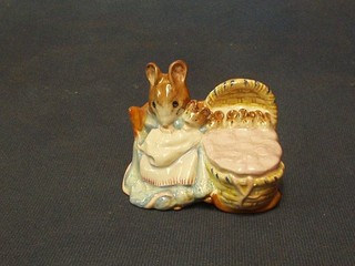 A Beswick Beatrix Potter figure Hunca Munca, brown mark to base and dated 1951