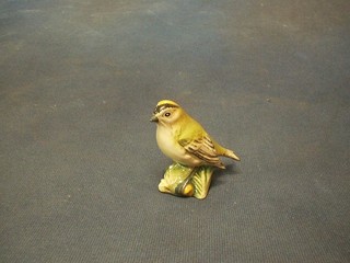 A Beswick figure of a Goldcrest, base marked 2415