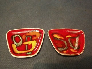 A pair of Poole Pottery Atomic orange key stone shaped pin trays, 3 1/2", bases marked 41 and 49