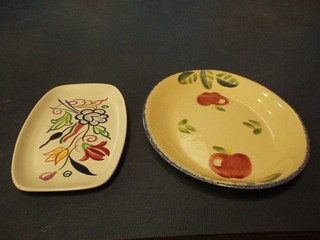 A rectangular Poole Pottery pin tray with floral decoration, base with dolphin mark 7" and an oval dish decorated apples 9"