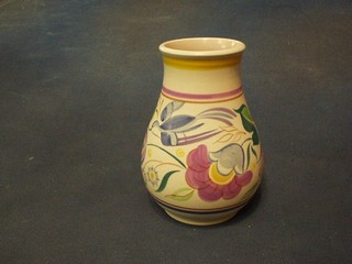 A circular Poole Pottery vase decorated flowers and birds, the base incised 266, 6"