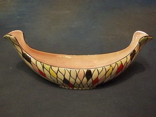 A Malingware boat shaped dish with multi-coloured pattern to the outside and with pink glazed interior, the base marked Maling 6605 13"