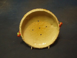 A Clarice Cliff Harvestware pattern straining bowl,  raised on 3 bun feet 7"