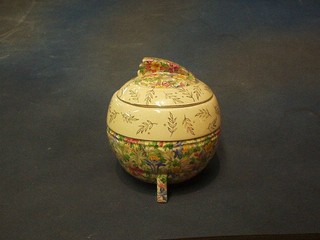 A circular Art Deco Wedgwood & Co pottery biscuit barrel and cover with floral decoration