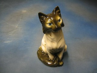 A Royal Dux porcelain figure of a seated cat, the base with pink triangular mark and impressed 63559, 13"