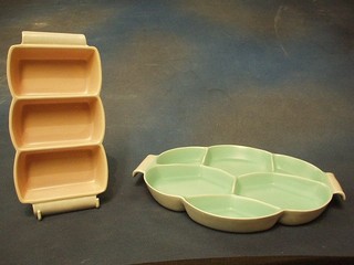 A pink glazed Poole Pottery rectangular 3 section twin handled hors d'eouvres dish (chip to 1 handle) and a circular 6 section dish