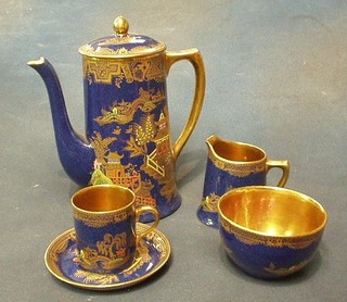 A Wiltonware 15 piece blue glazed coffee service with chinoiserie decoration comprising coffee pot, sugar bowl, cream jug and 6 coffee cans and 6 saucers